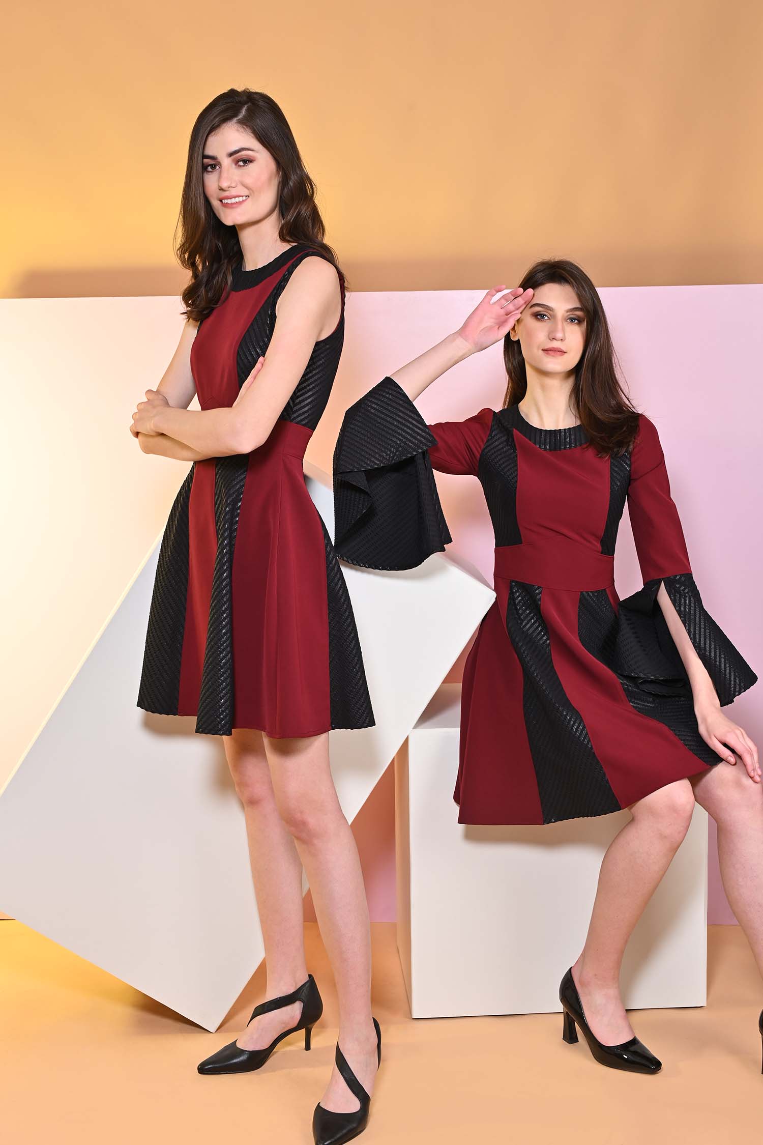 Sanguine Pitch flared dress with cape sleeves
