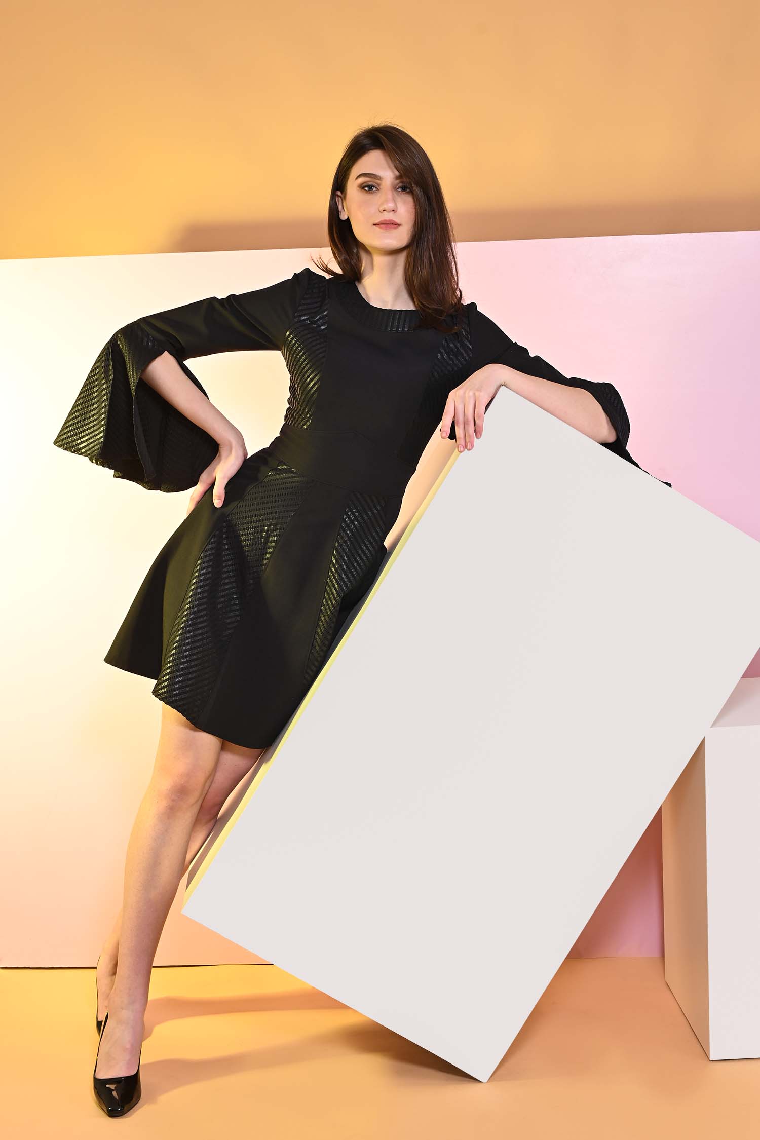 Black Pitch flared dress with cape sleeves